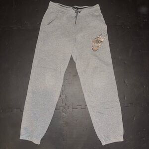 Women’s Nike Grey Fleece-Lined Joggers with Rose Gold Logo Tag